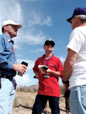 Jim Gilchrist speaks with other Minutemen